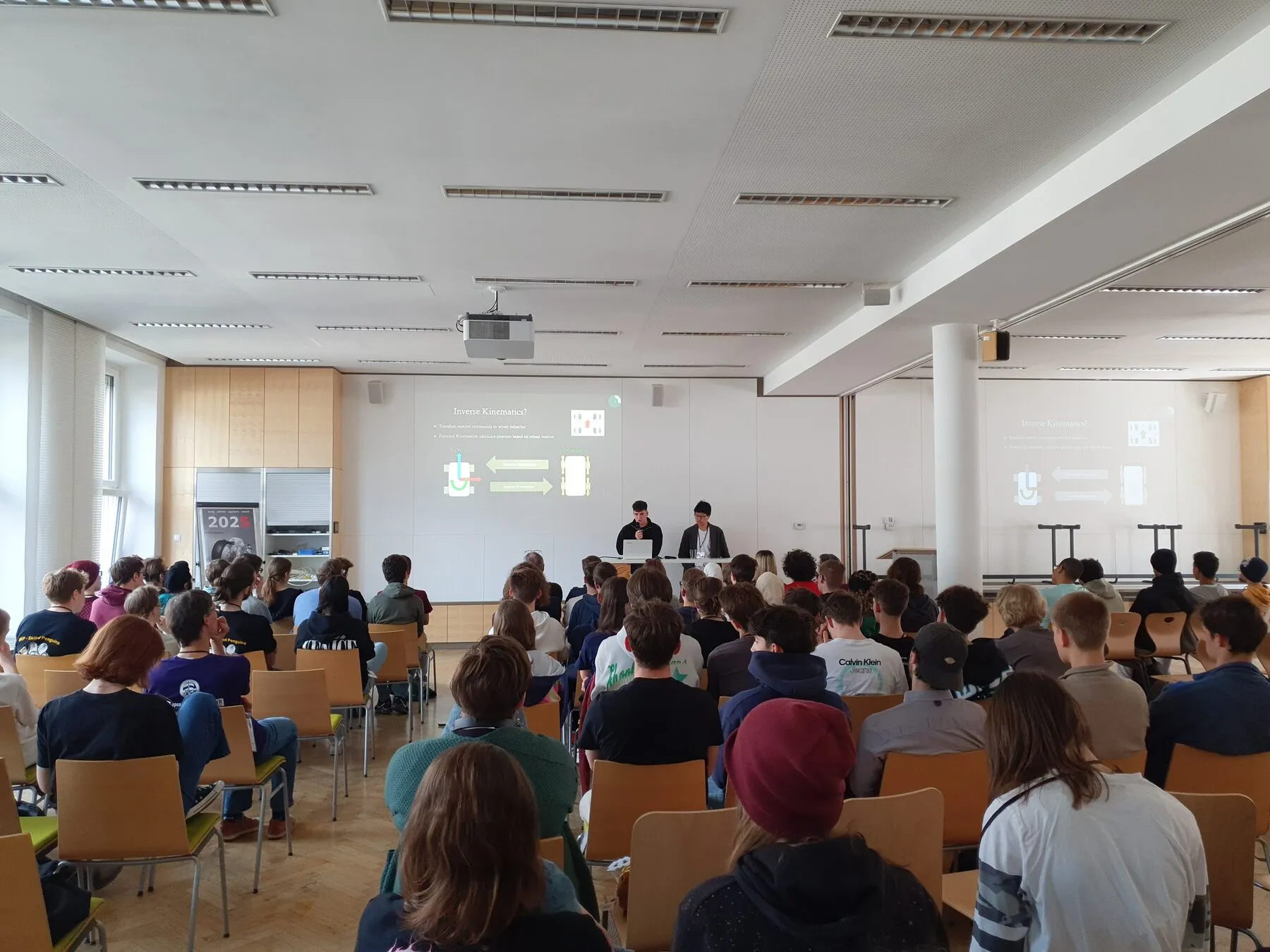 A full hall of students at an ECER session